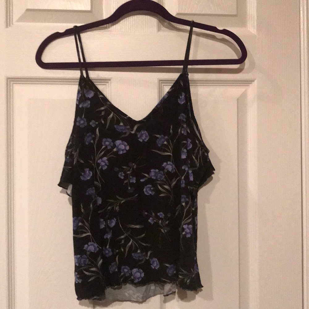 Black shirt with shoulders cut out.